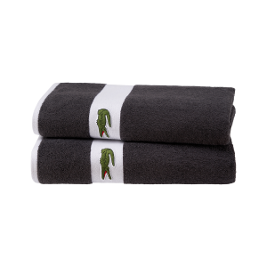 Two folded L Casual Lacoste Bath towels